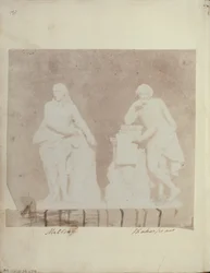 Beeldjes van Milton en Shakespeare